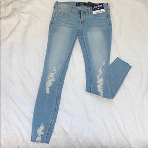 light blue ripped hollister jeans